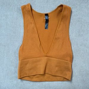 NEVER WORN. UO “Brass” top.
